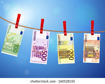 Euro banknotes hanging on a clothesline against a sky.