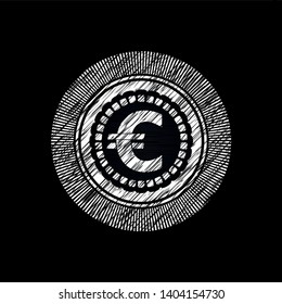 euro icon inside chalkboard emblem written on a blackboard