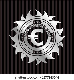 euro icon inside silver emblem