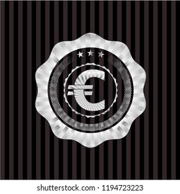 euro icon inside silvery emblem or badge