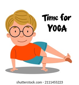 A European boy is standing on two hands, holding a balance. The child is engaged in sports. Time for yoga.