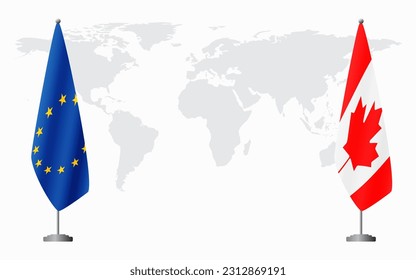 European Union and Canada flags for official meeting against background of world map.