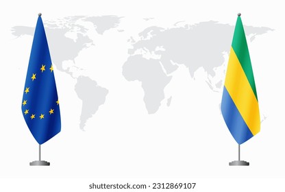 European Union and Gabon flags for official meeting against background of world map.