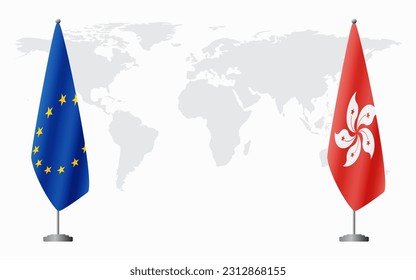 European Union and Hong Kong flags for official meeting against background of world map.