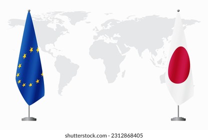 European Union and Japan flags for official meeting against background of world map.