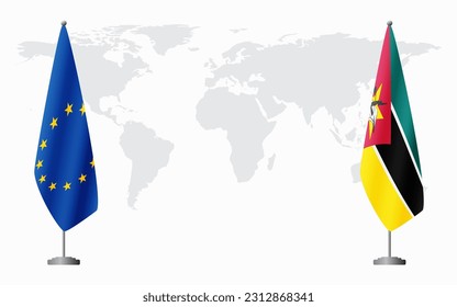 European Union and Mozambique flags for official meeting against background of world map.