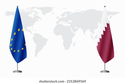 European Union and Qatar flags for official meeting against background of world map.