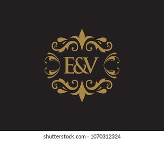 E&V Initial logo. Ornament ampersand monogram golden logo