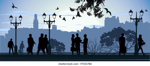Evening meeting at the mall on the city background