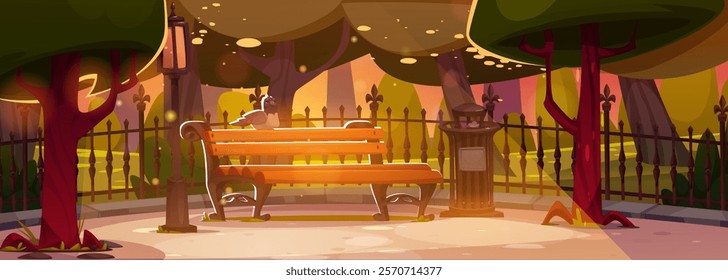 Evening park panorama - bird sitting on wooden bench under glowing sunshine, street lantern, trash bin and metallic fence. Sunset city landscape with magical lighting effect. Downtown public garden.