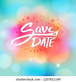 Event invitation with the words save the date written in white against a blurred bubble background