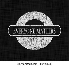 Everyone Matters chalkboard emblem on black board