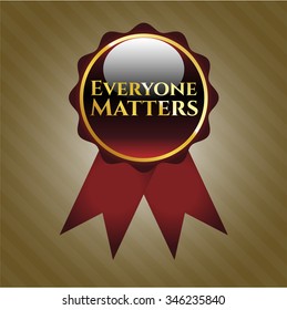 Everyone Matters gold emblem or badge