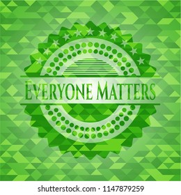 Everyone Matters green emblem with triangle mosaic background