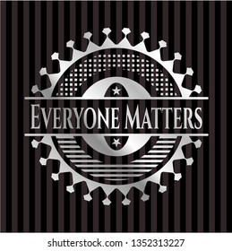 Everyone Matters silvery emblem or badge