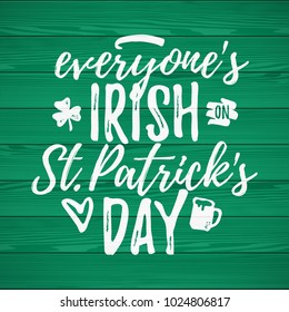 Everyone's Irish on St. Patrick's Day funny handdrawn dry brush style lettering on green wooden background, 17 March St. Patrick's Day celebration. Suitable for t-shirt, poster, etc., vector illustrat