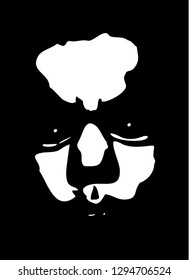 Evil and serious face of a man stencil on a black background. Vector art.