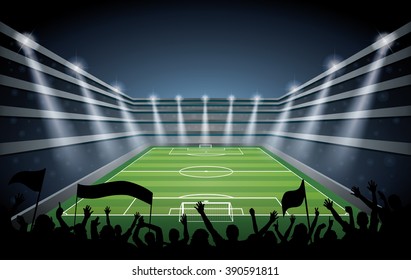Excited crowd of people at a soccer stadium.
