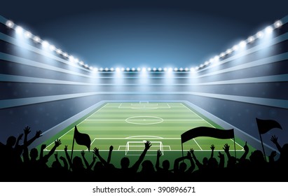 Excited crowd of people at a soccer stadium.