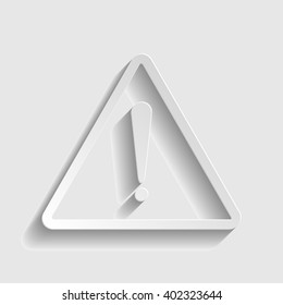 Exclamation danger sign. Paper style icon with shadow on gray