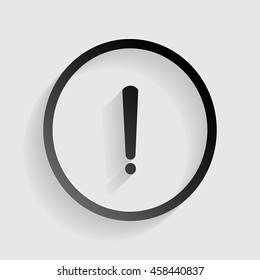 Exclamation mark sign. Black paper with shadow on gray background.