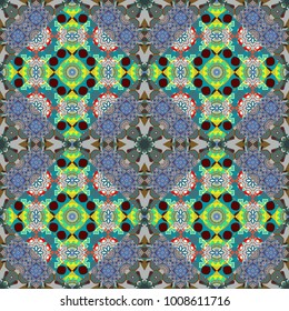It is executed in green, gray and blue colors. Seamless pattern in fractal design. Artwork for creative design, art and entertainment. Vector beautiful mandala.