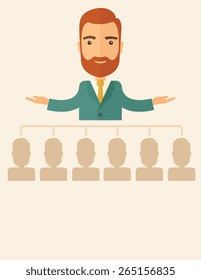An executive good looking and happy  Caucasian with beard explaining and presenting a business marketing plans to his employees in front of him inside the training room. Planning a business concept. 
