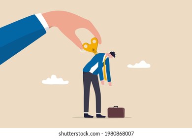 Exhausted employee recharged, power up or wind up to stimulate or motivate fatigue person concept, manager big hand turn wind up key or winder clockwork to motivate businessman office worker.