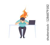 Exhausted tired man sitting at his working place with computer in office, businessman with burning brain, emotional burnout concept