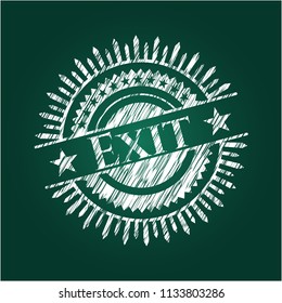 Exit written on a blackboard
