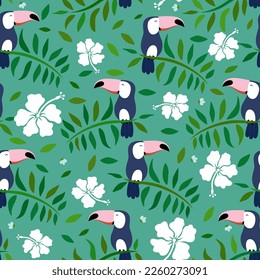 Exotic bird toucan, leaves and flowers. Cute seamless pattern.