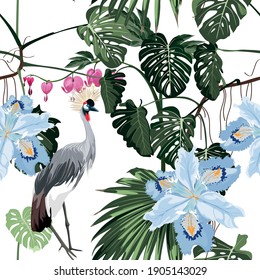 Exotic birds, iris flowers, monstera palm leaves, white background. Floral seamless pattern. Tropical illustration. Exotic plants, birds. Summer beach design. Paradise nature.  Japanese crane bird.