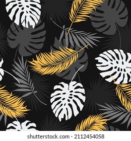 Exotic botanical background design. Vector seamless pattern with gold and black tropical leaves on a dark background.