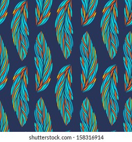 Exotic feather pattern. Colorful parrot feathers on navy blue background.  Seamless vector background.