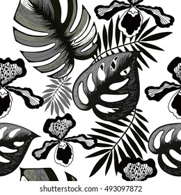 Exotic floral jungle seamless pattern. Tropical black and white texture. Monochrome tropic palm leaves and orchid and hibiscus flowers background. 