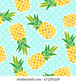 Exotic fruits on a blue background. Seamless background with pineapples on a blue background with polka dots. Yellow pineapples on a blue background.