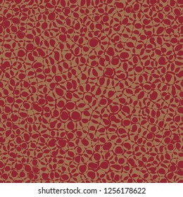 Exotic, jungle, animal, snake skin seamless pattern, speckled texture, background. Gold and red colors.