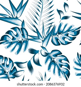 Exotic jungle plants illustration seamless pattern with blue abstract monochromatic tropical strelitzia flowers and monstera fern leaves on light background. Floral background. Exotic summer design 