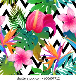 Exotic leaves and flowers on geometrical ornament. Seamless tropical pattern. Vector background with paradise bird flower and zigzag