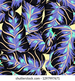 Exotic leaves on a green background. Tropical pattern with banana leaves.