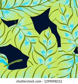 Exotic leaves on a green background. Tropical pattern with banana leaves.