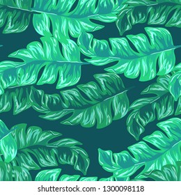 Exotic leaves on a green background. Tropical pattern with banana leaves.