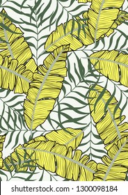 Exotic leaves on a green background. Tropical pattern with banana leaves.