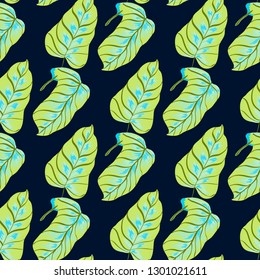 Exotic leaves on a green background. Tropical pattern with banana leaves.