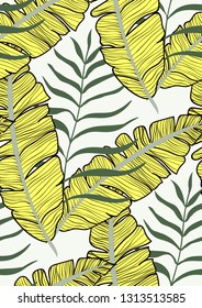 Exotic leaves on a green background. Tropical pattern with banana leaves.