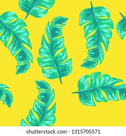 Exotic leaves on a green background. Tropical pattern with banana leaves.