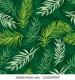 Exotic leaves, rainforest plants background. Seamless hand drawn tropical pattern in natural green colors. Vector background can be used for clothing, textile, fashion, interior, stationery, web.