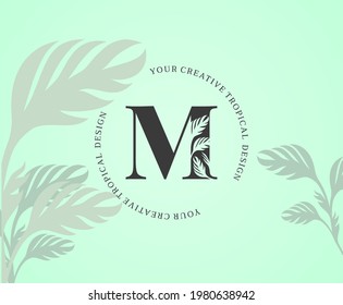 Exotic Letter M Logo with Monstera Plant Leaf Texture Design Logo Icon. Creative Tropical Monstera Plant Alphabetical Nature Logo Template.