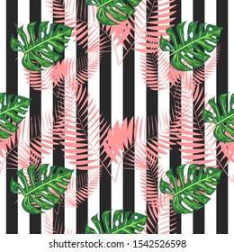 exotic seamless pattern with monstera palm leaves. Tropical hawaiian textile botanical design. Floral backdrop on the black white geometric background.