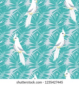 Exotic seamless pattern with a parrot and tropical leaves. Beautiful White Corella on the vine.
